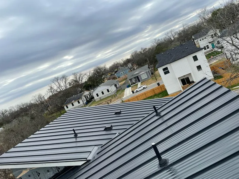 Standing seam metal roof panels with vents for Skylight Repair in Erlanger